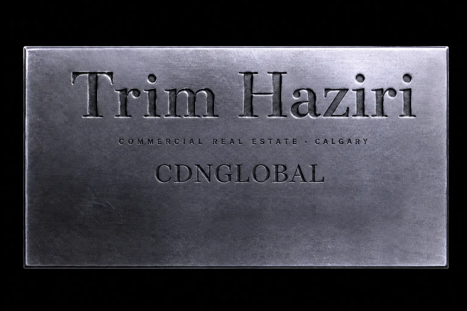 Engraved metal nameplate reading Trim Haziri, Commercial Real Estate, Calgary, CDNGLOBAL